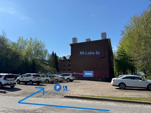 exterior shot of 86 Lake Street showing where the parking lot is in relation to the entrance