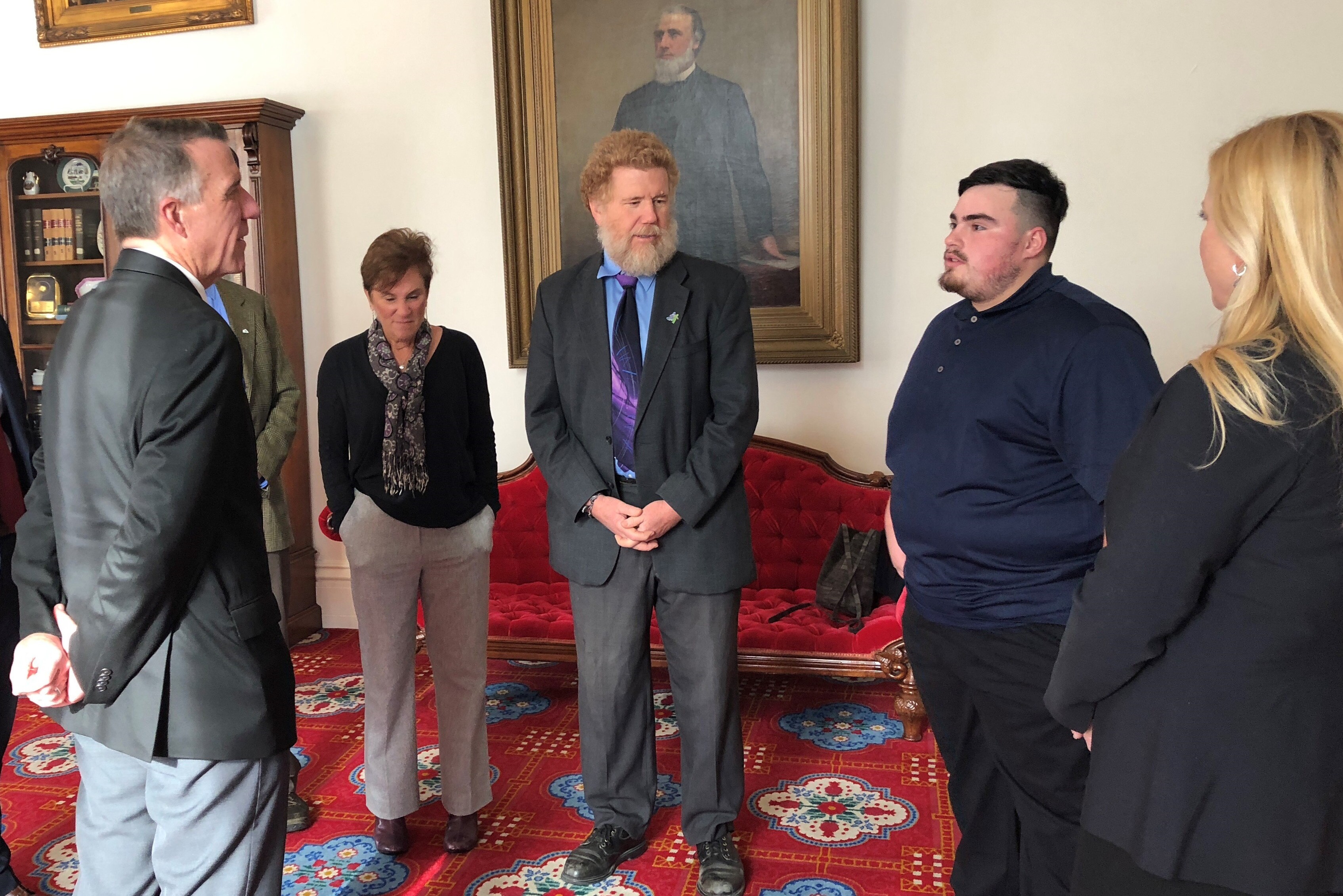 Chaice Lopez, Kids' Chance award recipient, converses with Governor Phil Scott during Kids' Chance Awareness Week in 2018. Board members Phyllis Phillips, Keith Kasper, and Heidi Groff look on.