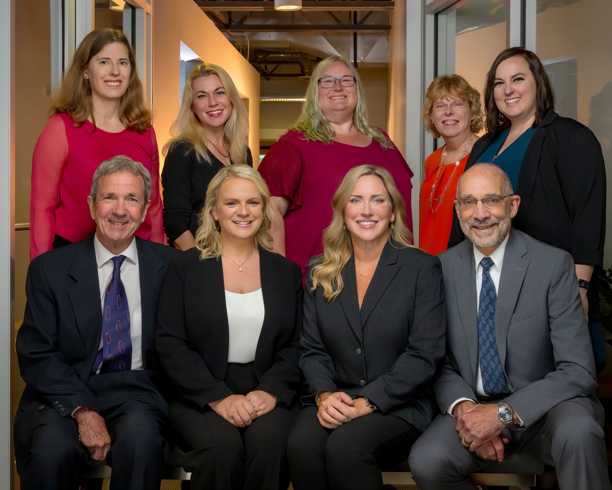 staff photo of attorneys and support staff at Biggam Fox Skinner, LLP